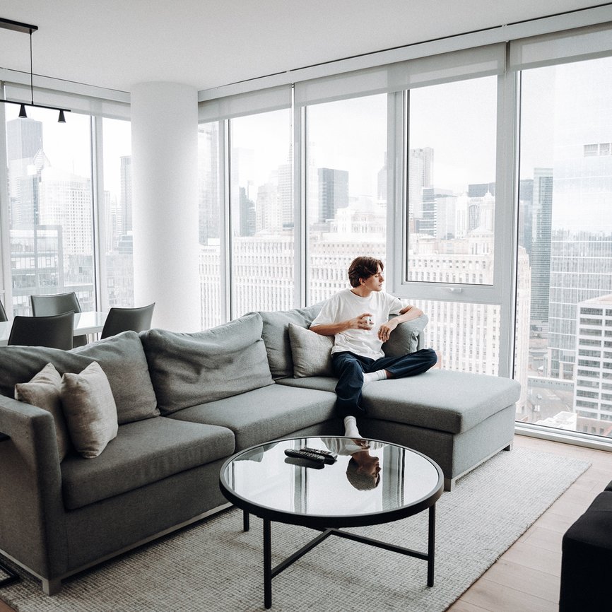 a man sipping the coffee with beautiful chicago city view at level chicago river north