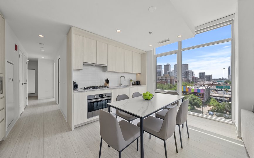 kitchen and dining area of three bedroom suite at level chicago fulton market