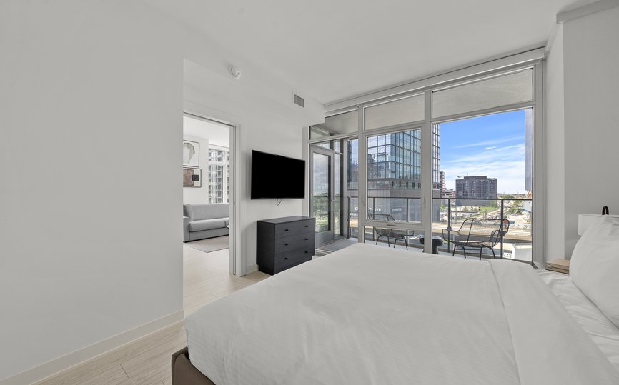 bedroom with wall mounted tv and clothes drawer at level chicago fulton market